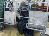 two carts that are next to each other on the ground