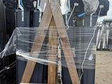 a wooden easel with a plastic covering on it