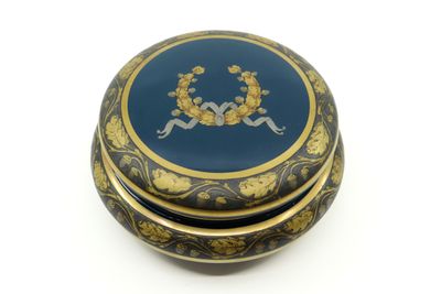 an image of a blue and gold box sitting on top of a white surface