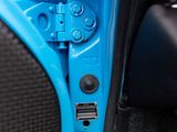a close up of a blue car door handle