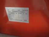 the label is on the side of a red container