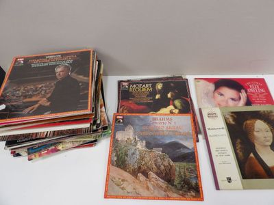 a lot of books on a white table