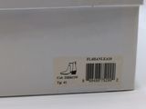 a white box with a label on it that says guess