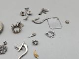 many different types of jewelry that are on the table