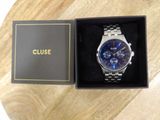a close up of a watch in a box on a table