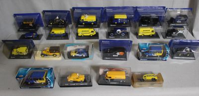 many different types of toy cars in a display case