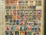 an open book with a lot of different stamps on it
