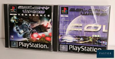 two video games are on display on a shelf in front of a white wall