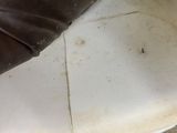 a close up of a person ' s shoe on the floor