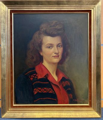 portrait d'une femme en chemise rouge dans un cadre doré