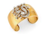 un bracelet manchette en or et diamants, signé Cartier