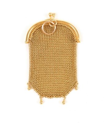 a close up of a gold purse on a white background