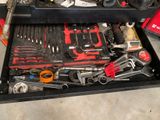many tools in the drawer of a tool box