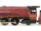 a toy train that is sitting on a white surface