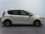 a picture of a white car parked in a parking lot