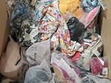 a box full of clothes and other items in it