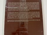 the back cover of a book with a picture of a man ' s face on it