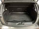 a trunk of a car with the back door open