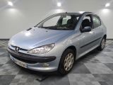 a picture of a silver car parked on a checkered floor