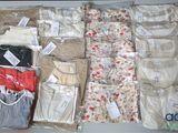 many different types of clothing in a box