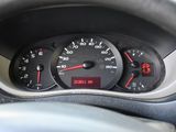a close up of a car dashboard with a speedometer