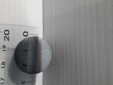a measuring tape on the door handle of a door