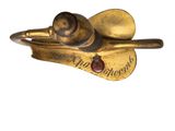 an image of a gold snail brooch with a red stone