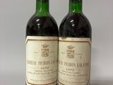 deux bouteilles de vin posées l'une à côté de l'autre sur une table