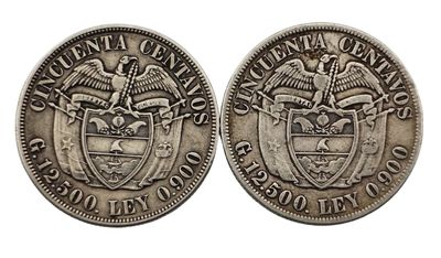 une pièce d'argent sur laquelle figurent un aigle et un bouclier