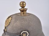 a helmet that is sitting on a white surface