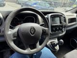 dashboard view of a car with a steering wheel and dashboard controls