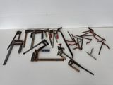 a lot of tools that are laying out on the floor