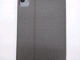 a close up of a gray case with a camera on top of it