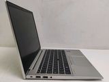 a laptop computer that is sitting on a table
