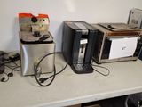 a lot of appliances that are sitting on a table