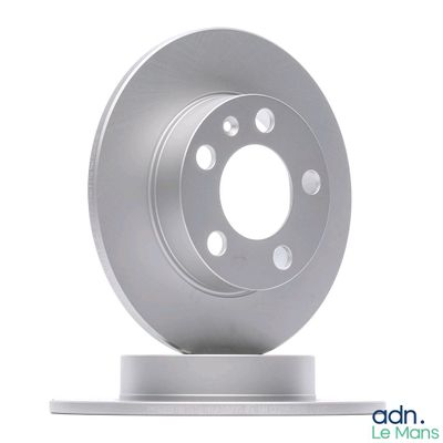 the front of a silver brake disc on a white background