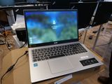 a laptop that is sitting on a table in a room
