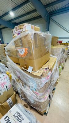 many boxes stacked on top of each other in a warehouse