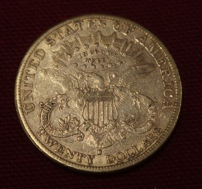 une image d'une pièce de monnaie sur laquelle figure un aigle