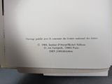 a close up of a piece of paper with a picture on it
