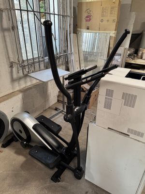 an image of a stationary exercise bike in a garage
