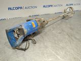 a close up of a blue electric drill on a metal surface