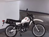 a motorcycle that is parked in a parking garage