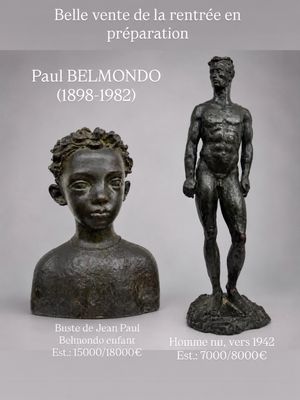 deux statues en bronze représentant un homme et une femme, dont l'une se tient à côté de l'autre