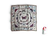 an image of a white square with a floral design on it