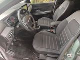 the interior of a car with black leather seats and a steering wheel