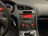 a dashboard of a car with a clock on it