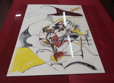 a drawing of a woman riding a horse on a red table