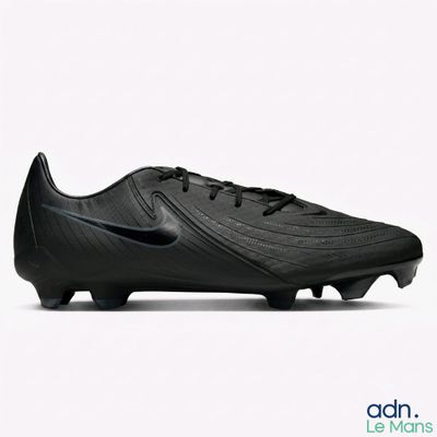 a close up of a pair of black soccer shoes on a white background