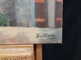 a picture of a painting of a building on a easel